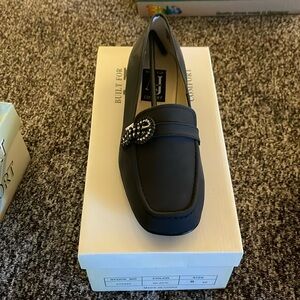 AJ Valenci loafer with crystal buckle detail.